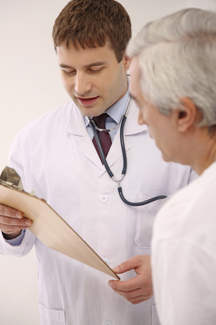 Doctor attending to his patient